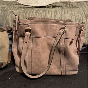 Tan/ Taupe colored suede like purse.